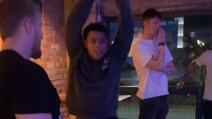 Pal decides to two-foot tackle his mate for some banter during a bowling game