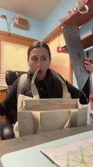 Water Bottle Spill Ruins Contents of Woman's Bag