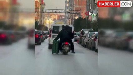 Motosikletle Valiz Taşıma Yöntemi Görenleri Şaşırttı