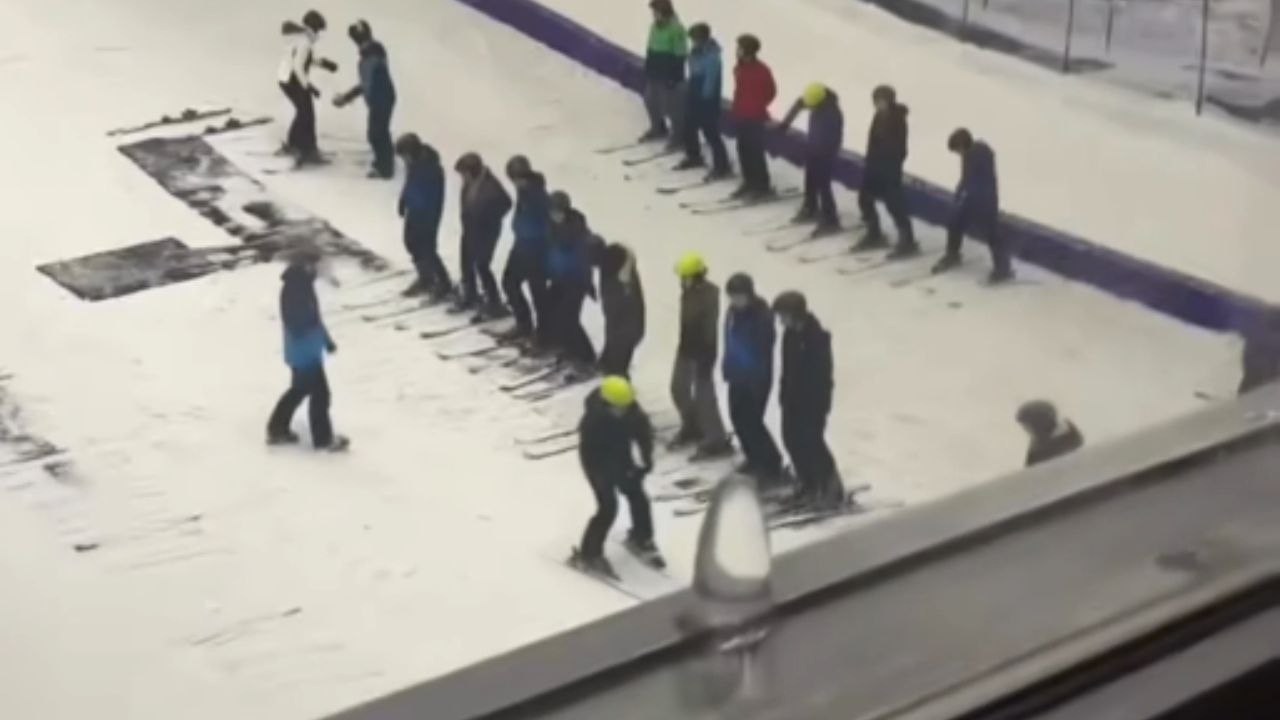 Skiing lesson for beginners turns into a series of amusing stumbles and laughs