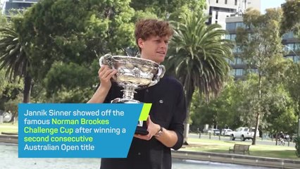 Sinner shows off Australian Open trophy after retaining his crown
