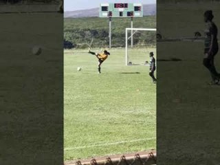 Goalkeeper Falls While Trying to Kick Soccer Ball