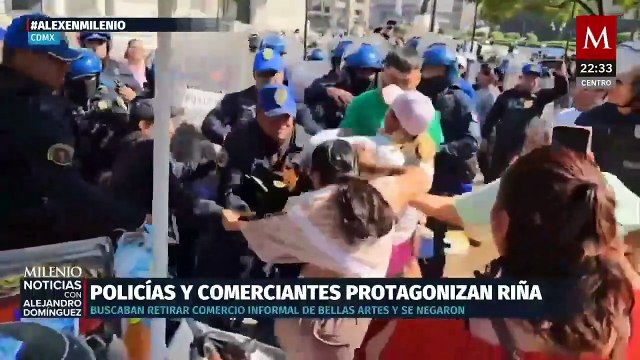 Riña entre policías de la SSC-CdMx y vendedores ambulantes en la Alameda Central