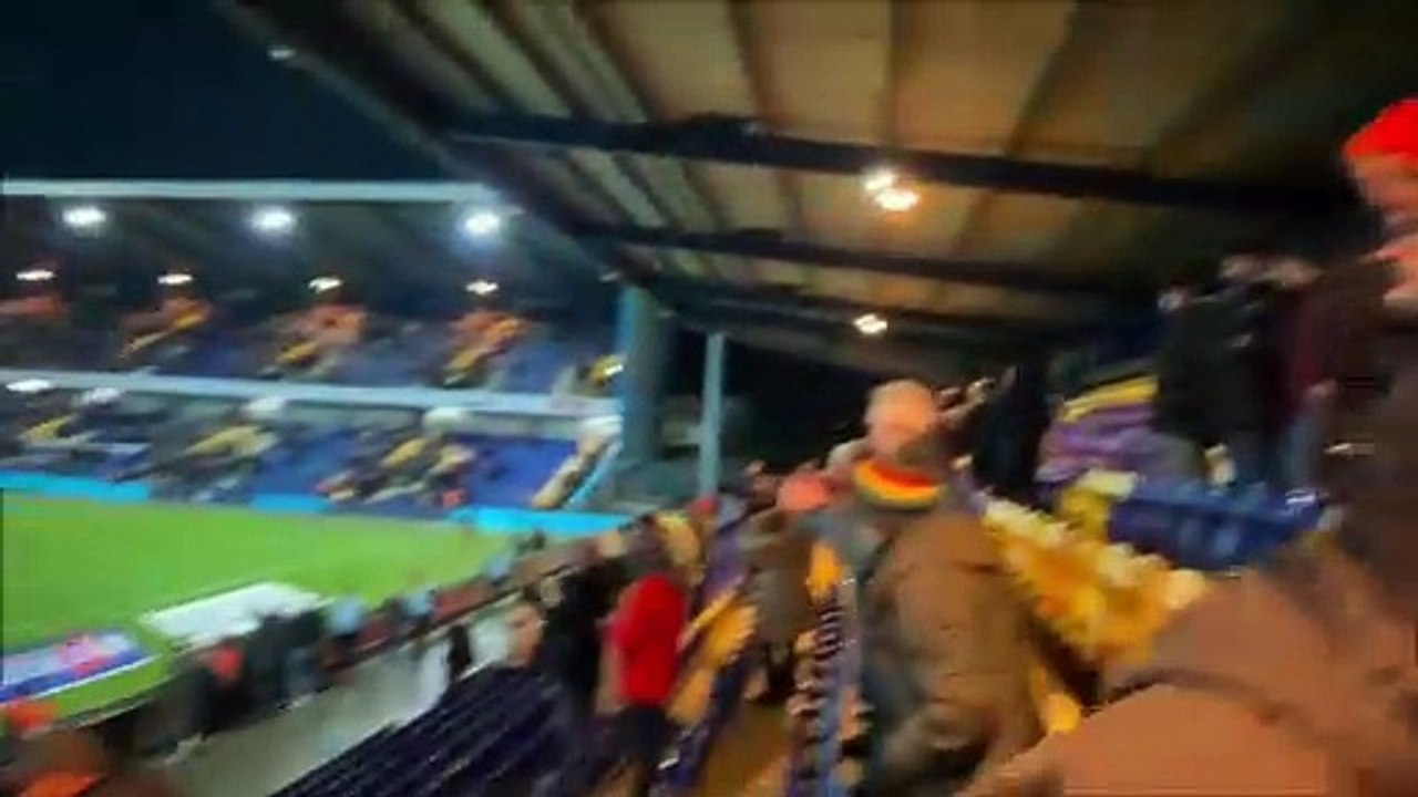 Crawley Town fans celebrate win at Mansfield Town