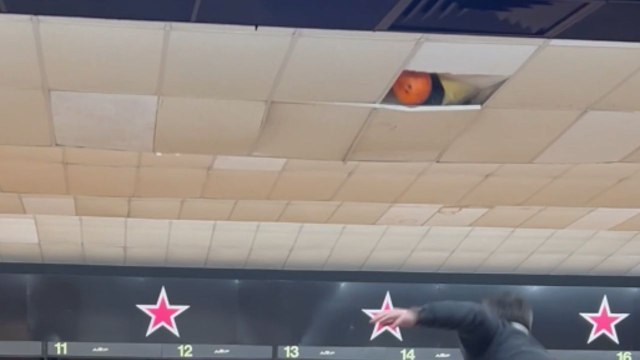 Hilarious bowling fail: Guy sends the ball flying into the ceiling