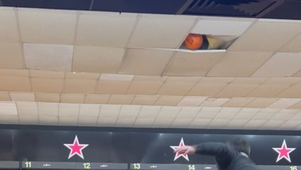 Hilarious bowling fail: Guy sends the ball flying into the ceiling