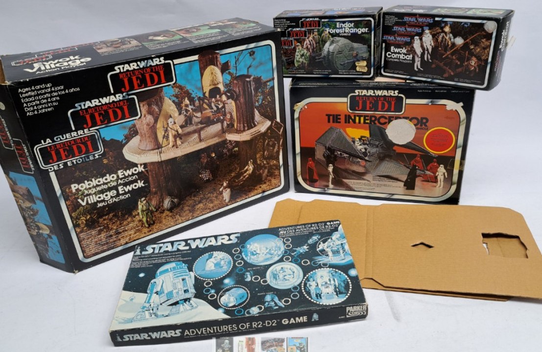 An array of Star Wars memorabilia has been sold for thousands at auction