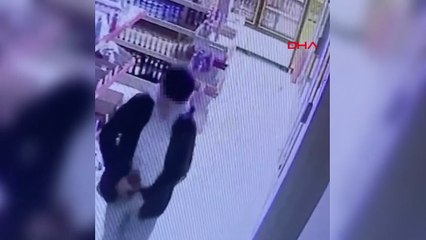 Markette içkiyi pantolonun içine sokup çaldı
