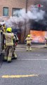 Nearly six dozen firefighters battle the intense fire wrecking building in Kilburn