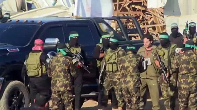 Watch: Hamas militants hand over Israeli hostages Yarden Bibas and Ofer Kalderon to Red Cross under ceasefire deal