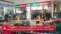 AVM'de korku dolu anlar! Yemek yerken kafasına asma tavan düştü