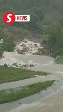 One dead, thousands of Australians urged to evacuate as Queensland battles floods