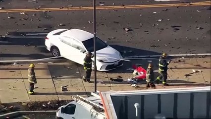 Philadelphia plane crash: Aerial footage shows gaping crater and debris scattered across street