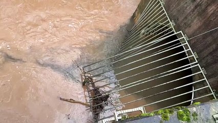 Waterpipe discharging sewage into river