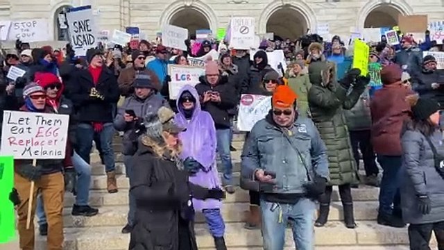 Protestors of President Donald Trump's early actions in the White House chanting Elon Musk has got to go
