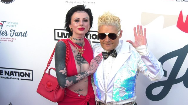 Adrien Skye and Corey Feldman on the red carpet at Steven Tyler’s 6th annual Grammy Awards viewing party