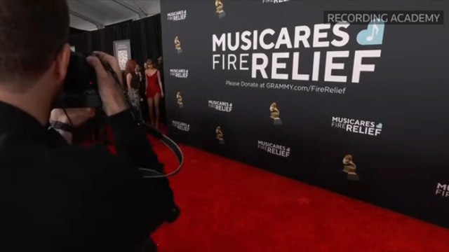 Taylor Swift mesmerizes in spectacular red dress on Grammys red carpet