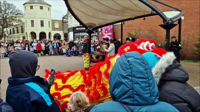 White Crane Martial Arts' Lion Dance Team performing in Worthing town centre