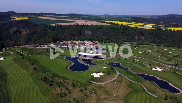 Aerial drone view of golf course and ponds