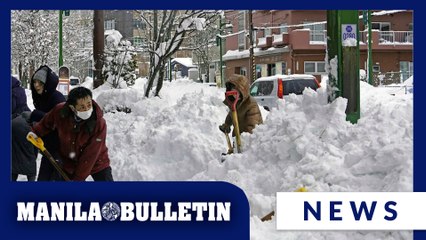 Parts of northern Japan have 4 feet of snow and more is falling