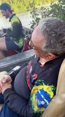Comical prank makes man believe he hooked a fish while napping on the boat