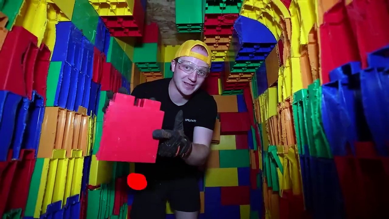ESCAPING 100 LAYERS OF LEGOS! (100FT DEEP!)