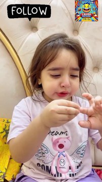 Innocent child talking with parents .