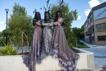 The witches of Lakespeare's Macbeth wander through the audience on opening night