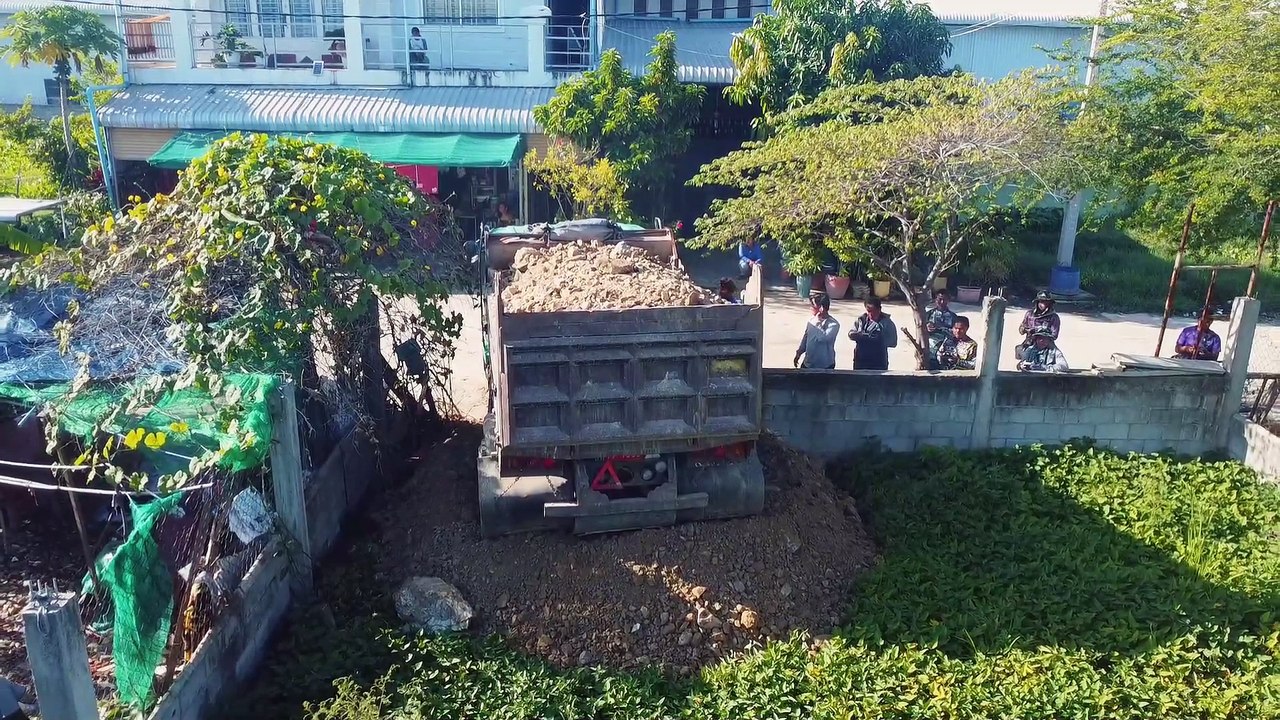 Completed project!! Dozer D20 &5T Truck pushing stone on land 10x20m