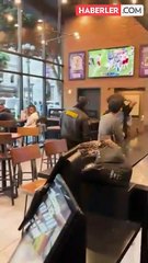 Güvenlik görevlisi, restorandan ayrılmak istemeyen kadına tokat attı