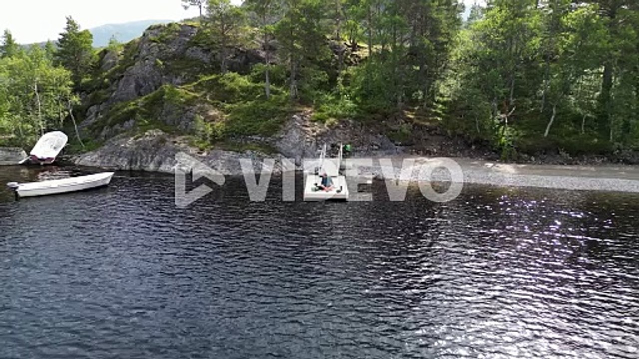 Aerial drone shot of islands, forest and fjord, Norway