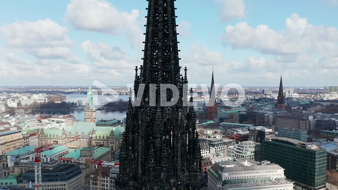 Aerial close up view of dark charred spire of St