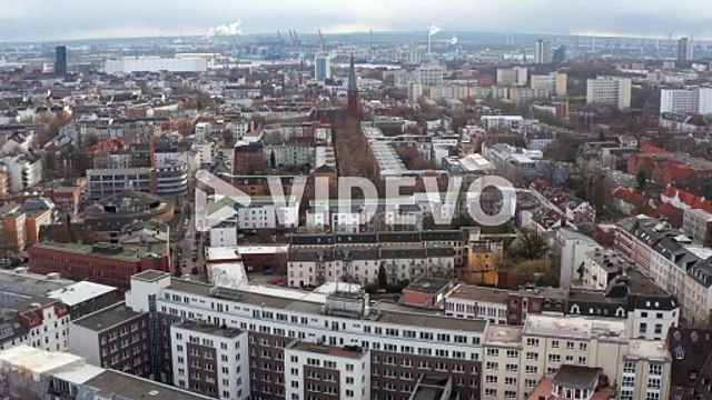 Aerial view of houses in residential neighborhoods and old church in Hamburg city center