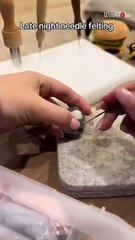 Creating a wool raccoon car freshener with skillful needle-felting precision
