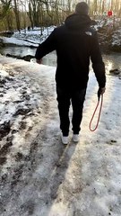 Hilarious moment as man keeps slipping on icy path while his wife bursts into laughter