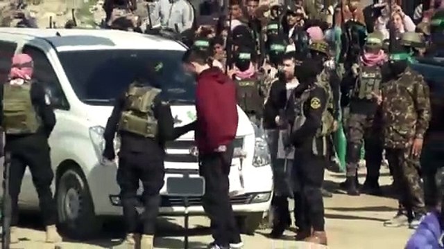 Moment Hamas releases three hostages from Gaza as ceasefire holds