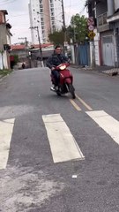 Man Falls Attempting Scooter Wheelie