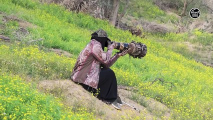 UAE woman who beat polio and won $50,000 award for wildlife photography.