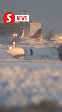 Delta plane flips upside down on landing at Toronto airport, injuring 18