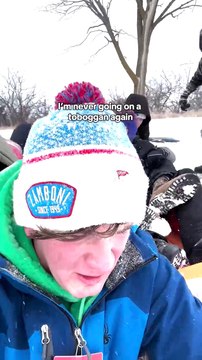 Man's Sledding Adventure Ends with Snowy Face