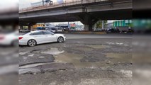 Intersección de la autopista Duarte en grave deterioro por fugas