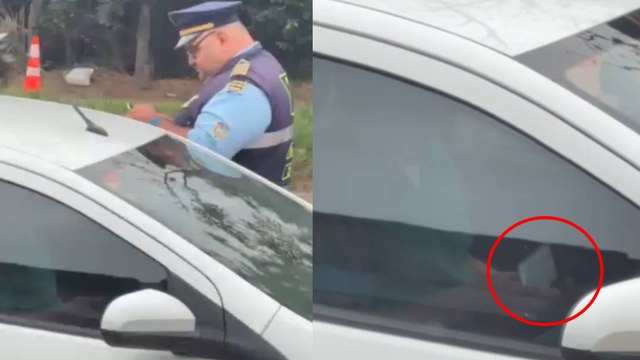 VIDEO | Agente de tránsito fue visto recibiendo presunto soborno de un conductor en Santander