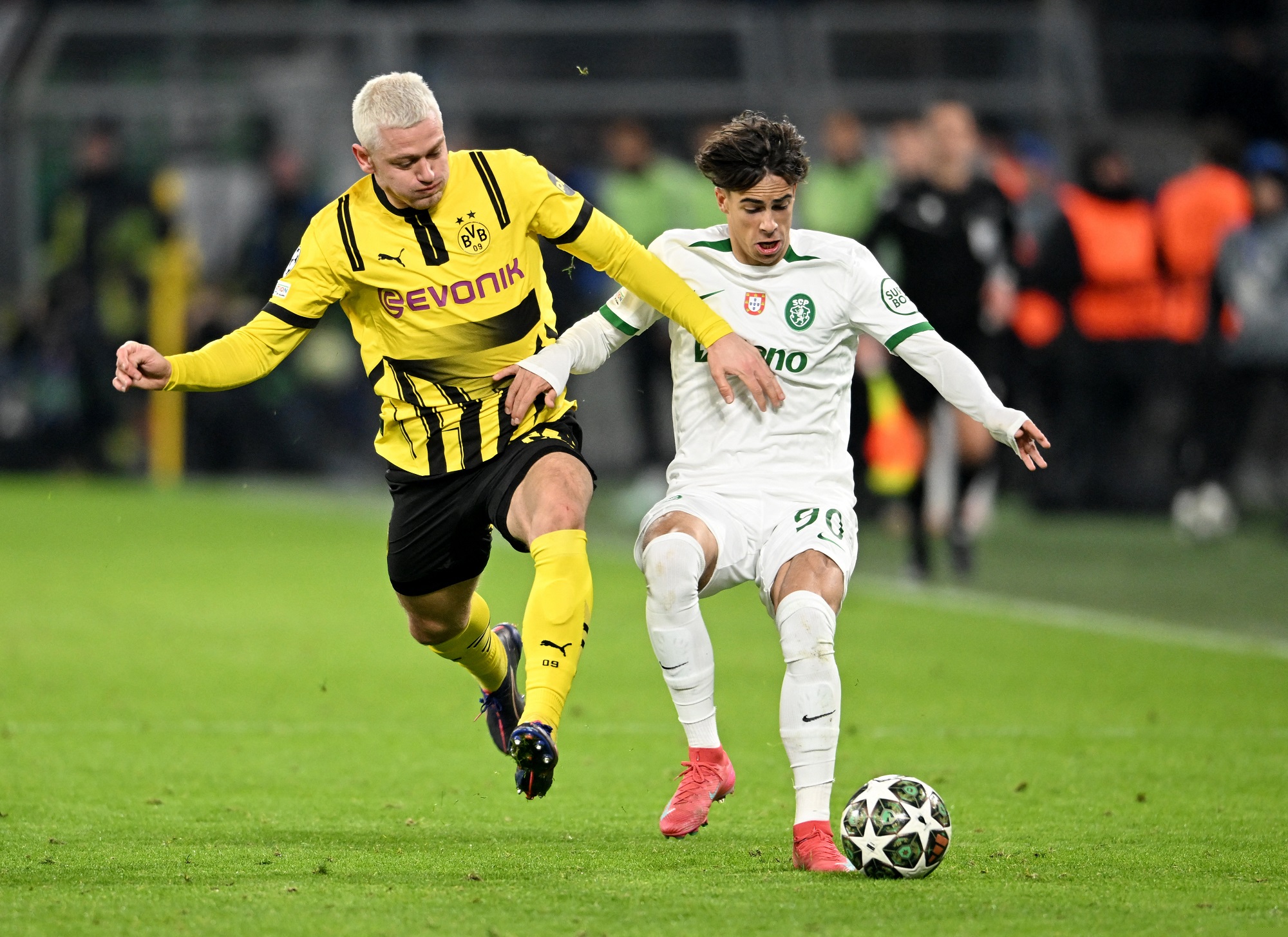 Dortmund ease into Champions League last 16 after Sporting stalemate