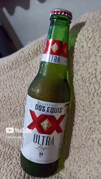 Entre botanas y bebidas cervezas XX lager ultra y churritos el campesino #shorts acostado descansand