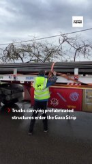 Trucks carrying prefabricated structures enter southern Gaza