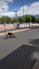 Cyclist Loses Balance and Falls After Letting Go of Handlebars