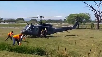 Defensa Civil rescata haitianos en finca inundada por huracán María