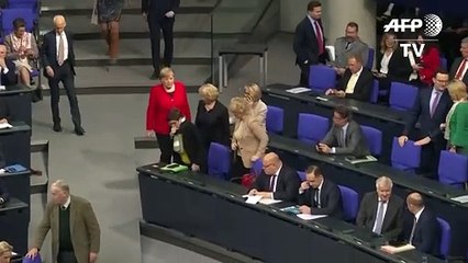 Merkel defiende la OTAN tras las críticas de Macron