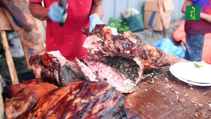 Venta de cerdo callejera en víspera de Navidad