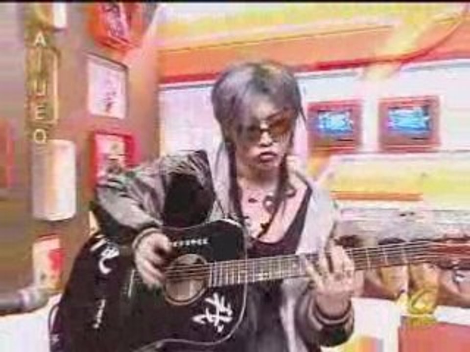 Miyavi Slappin' His Guitar